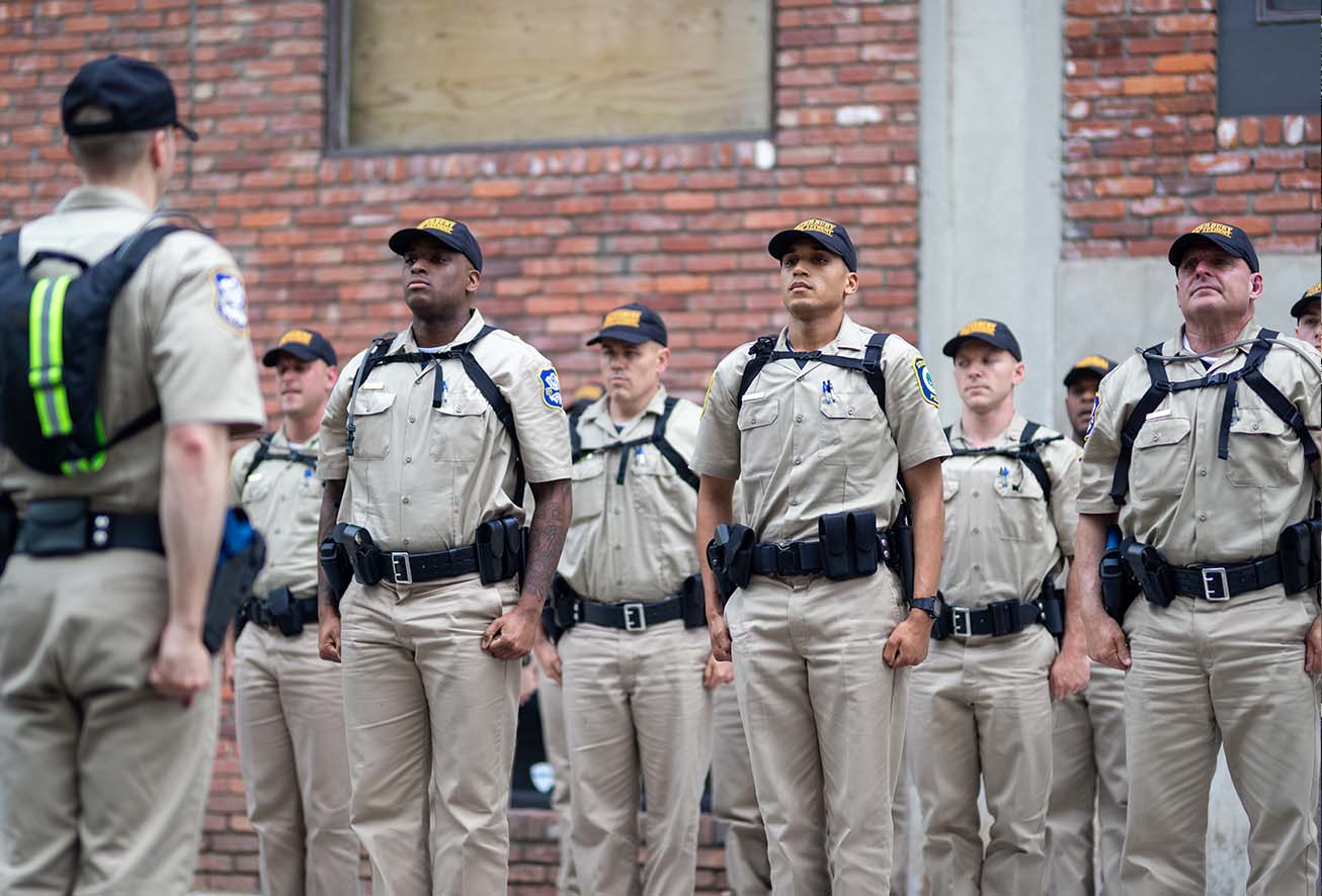 A group of Waterbury police recruits standing in formation during an academy inspection or drill